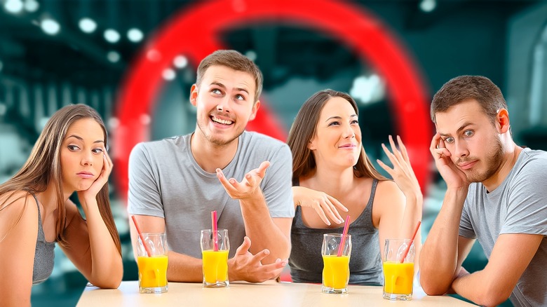 happy and unhappy couple at bar