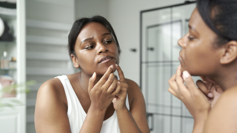 Woman examining breakout