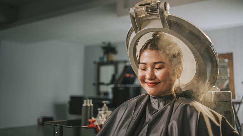 Girl in salon with hair mask