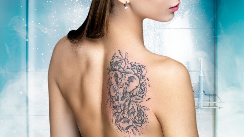 Woman with back tattoo