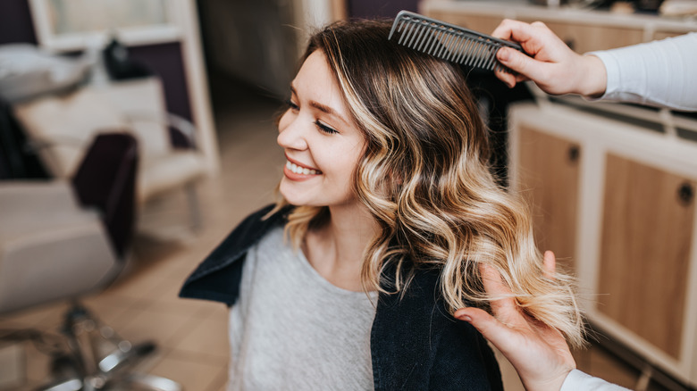 woman at hair salon with balayage