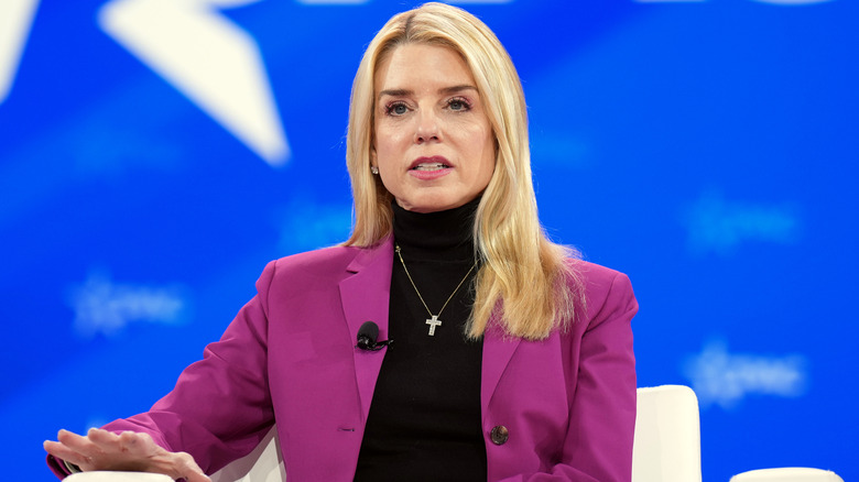 Pam Bondi in a fuchsia blazer