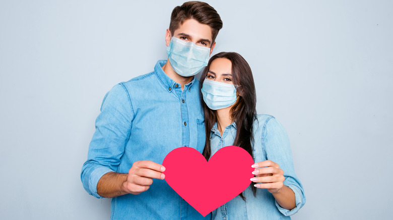 couple wearing masks