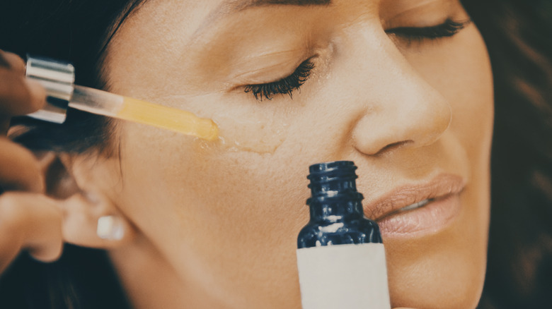 woman with tinted drops