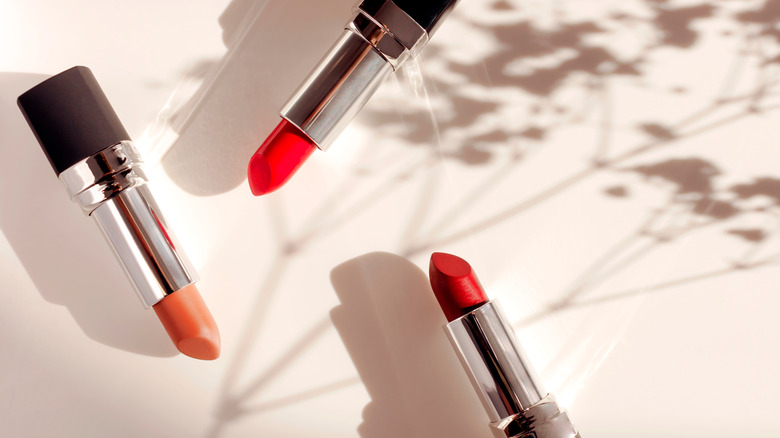 lipsticks laying on table 