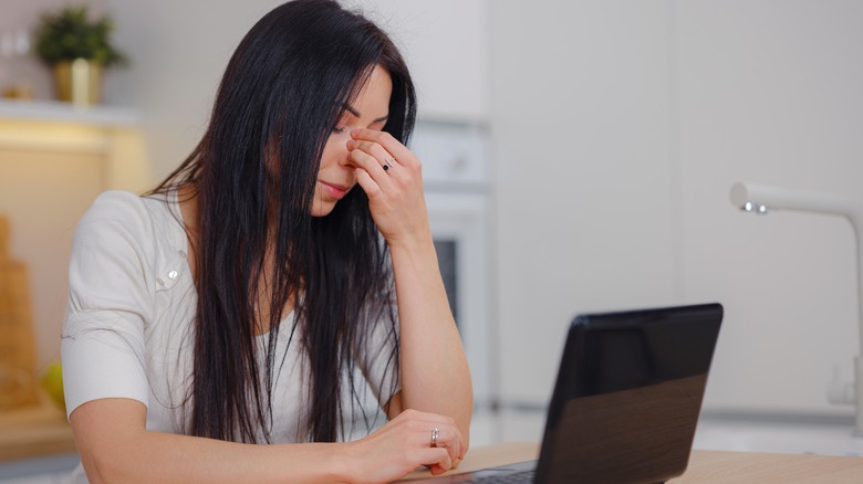 woman feeling stressed