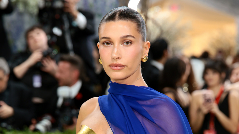 Hailey Bieber posing at an event