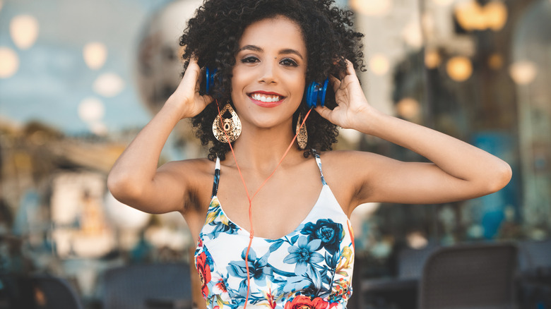 Woman in multicolored floral dress 