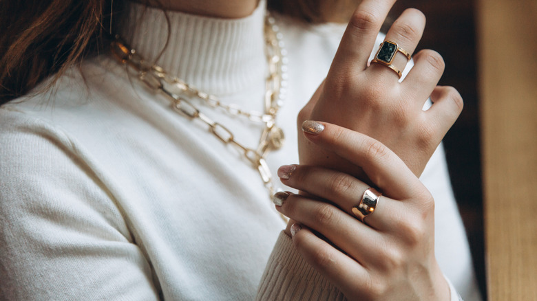 Woman wearing gold jewelry