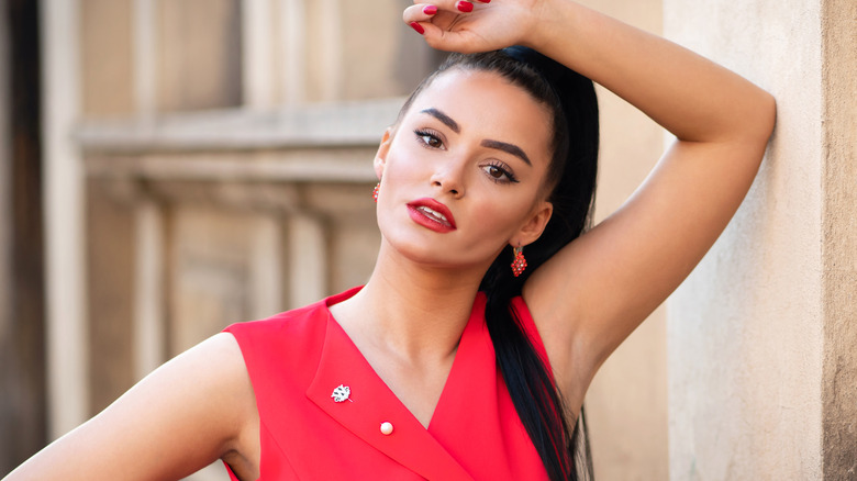 Woman wearing red dress and lipstick