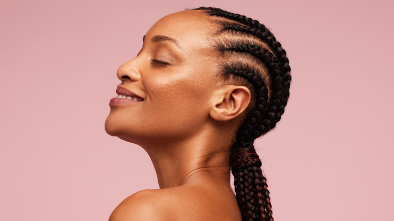 woman posing with braids