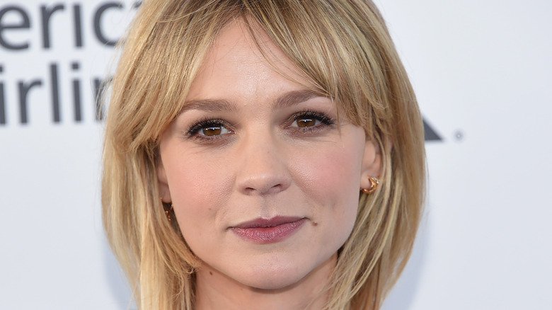 Carey Mulligan on red carpet with curtain bangs