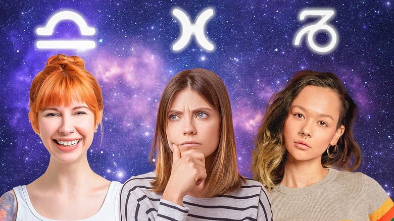 Three women contemplating zodiac signs 