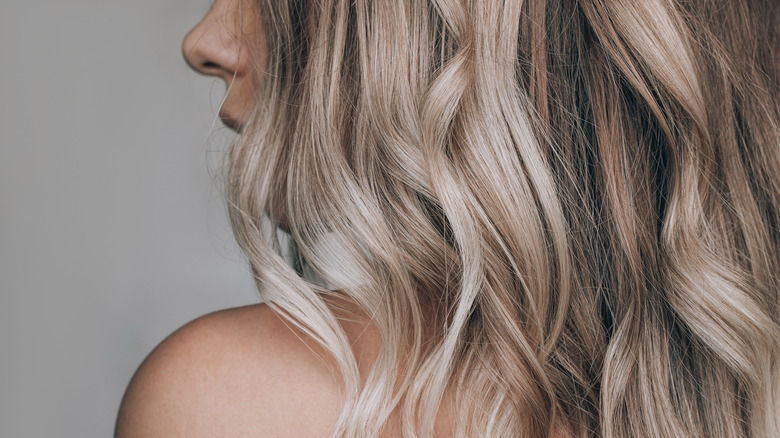 Woman with blonde wavy hair 