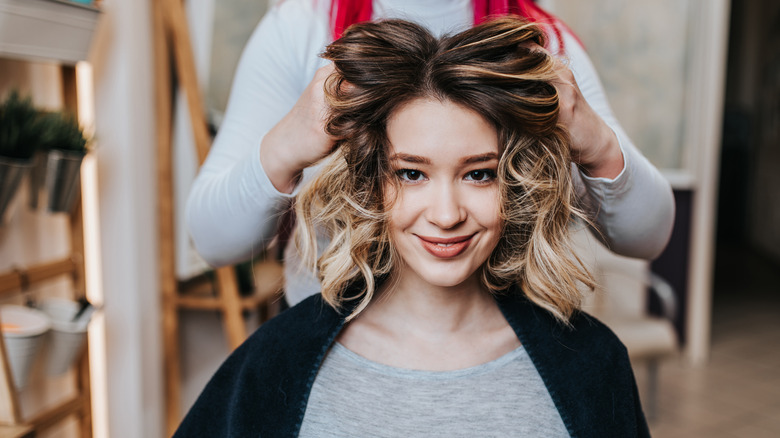 Woman having her hair done