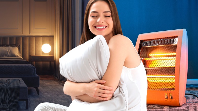 Dim bedroom, woman hugging pillow, floor heater