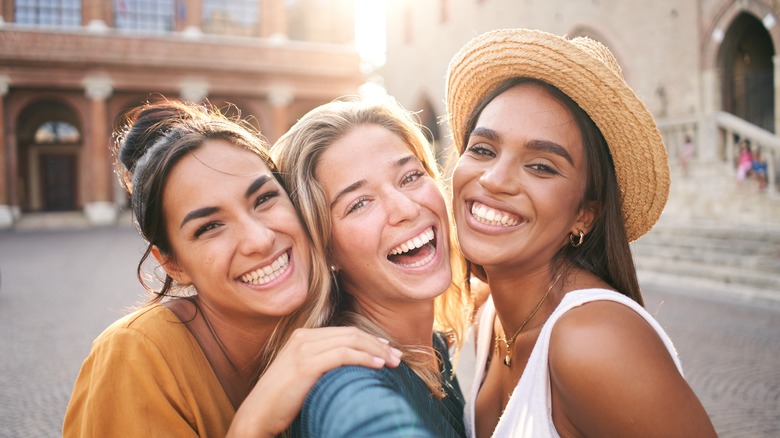 Women taking group photo