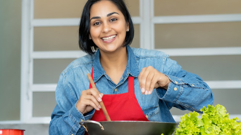 Woman cooking at home