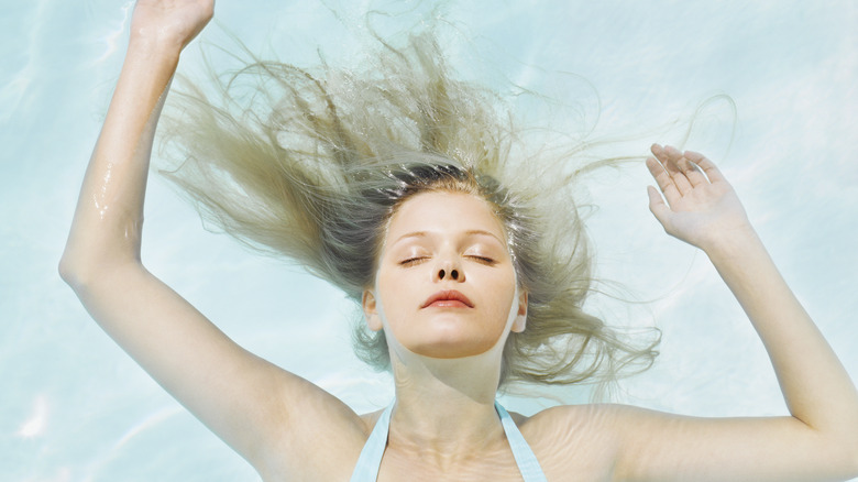 A woman in a pool