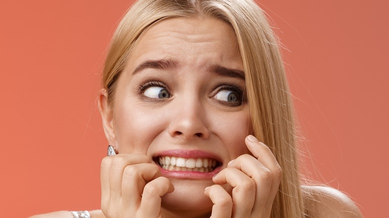 Girl in dress feeling anxious