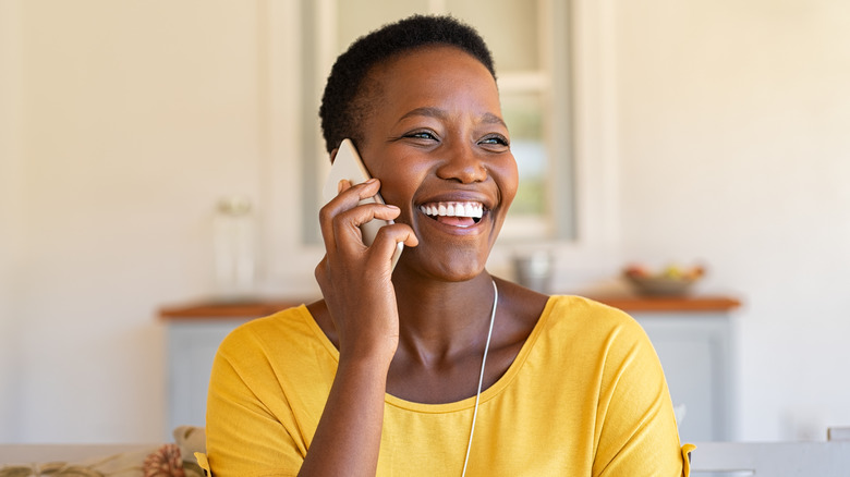 happy woman on phone