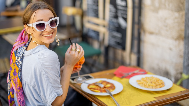 Woman smiling with food
