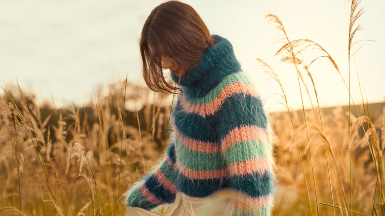 Girl wearing mohair sweater.