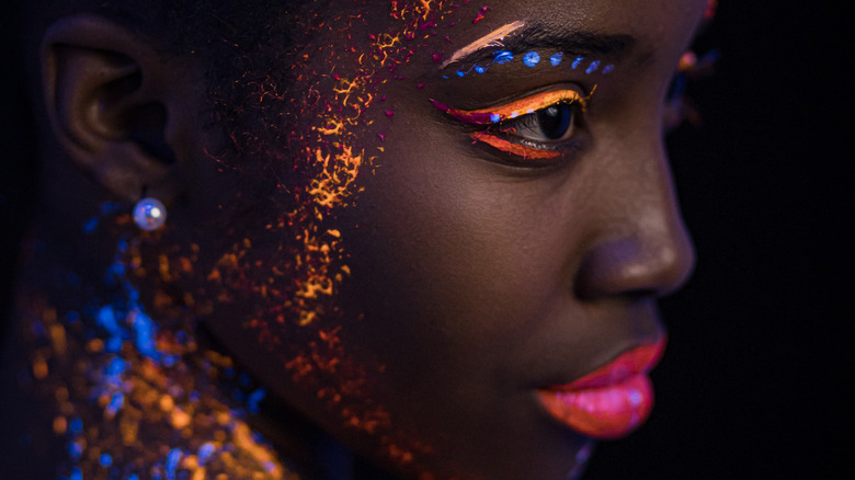 Woman wearing neon makeup