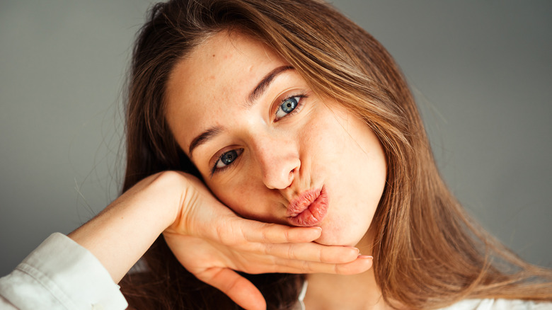 Fresh-faced woman posing