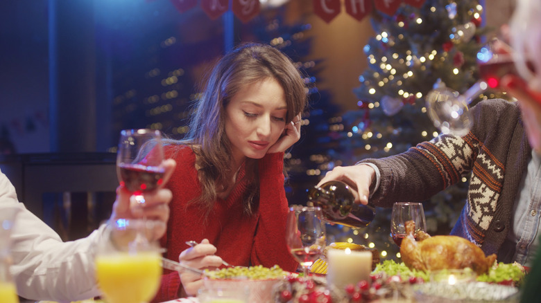  sad woman at holiday dinner 