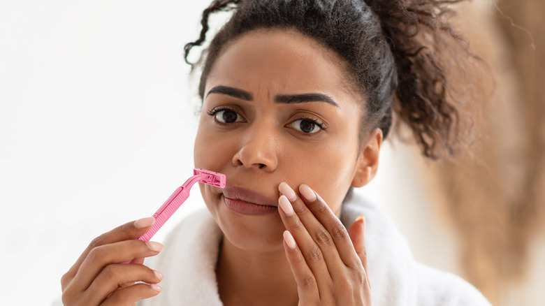 Trying to shave with razor bumps 