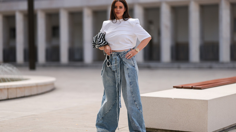 Woman wears flared jeans