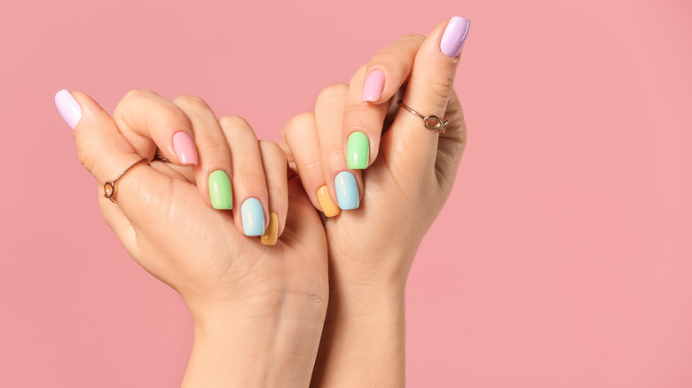 Woman with multi-color manicure