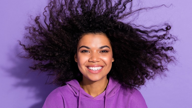 woman shaking her hair out