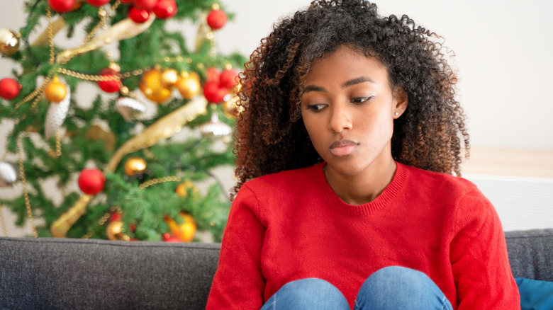 woman feeling sad at christmas