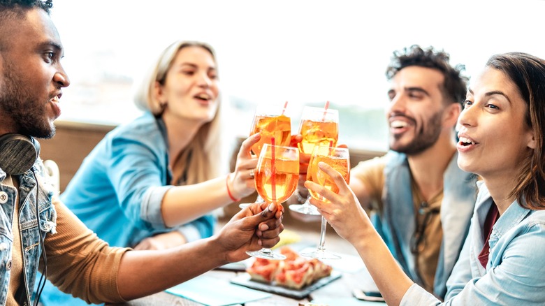 Friends gathered around table