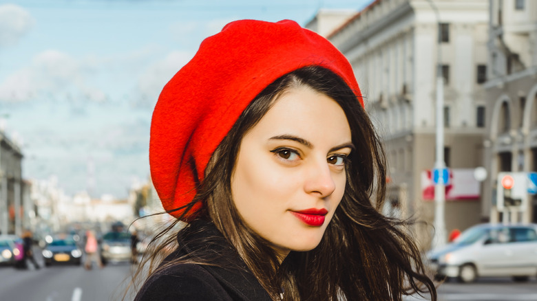 Woman with red hat red lipstick