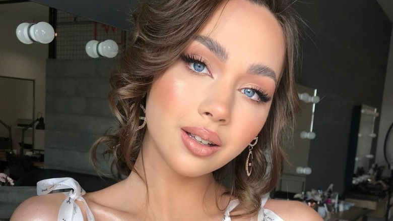 Woman wearing soft glam makeup 