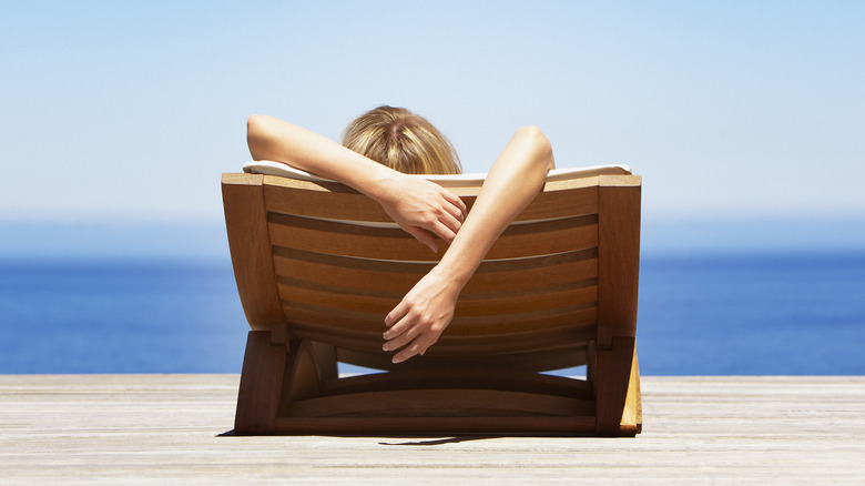 woman tanning on beach