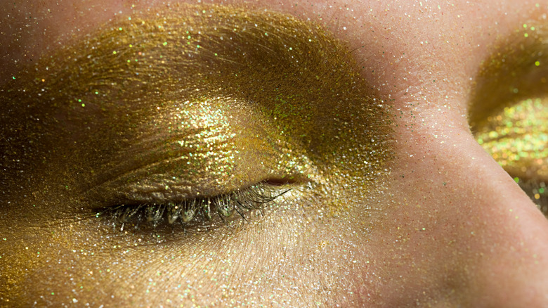 Shimmery gold eyeshadow and brows
