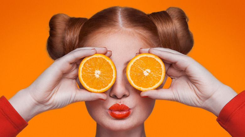 woman in orange lipstick