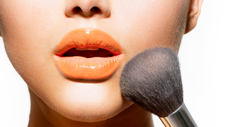 Shiny orange lips