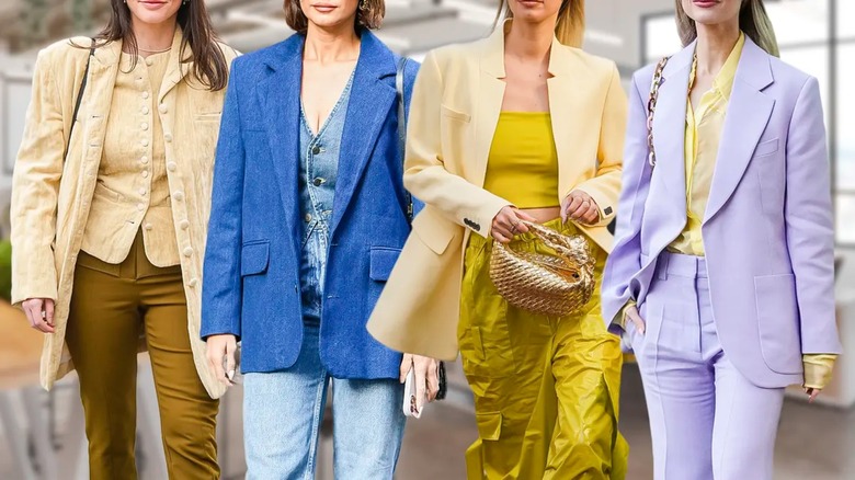 line-up of four women in colorful corporate wear