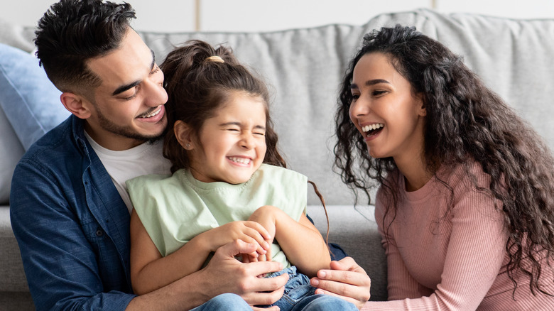 three people happy family