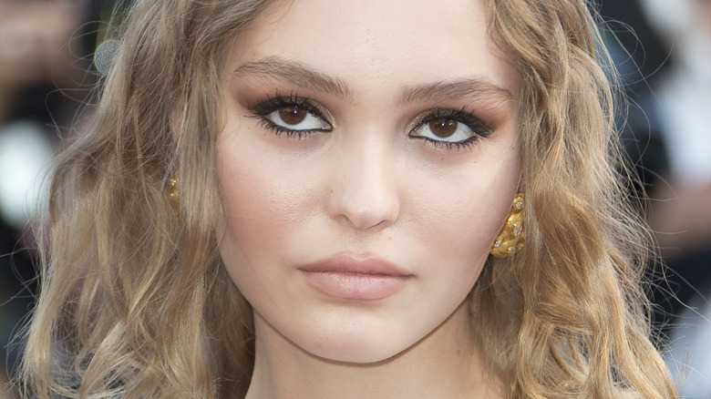 Lily-Rose Depp wearing a smokey eye and waterline eyeliner