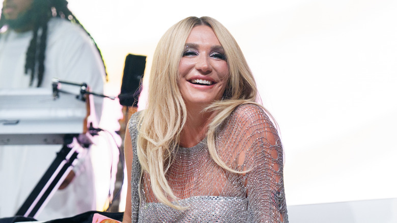 Ke$ha smiling with shiny makeu