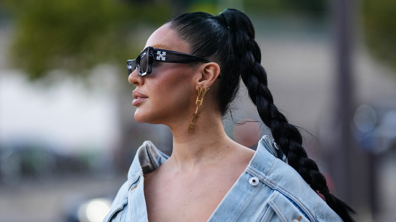 Woman with pony-braid hairstyle