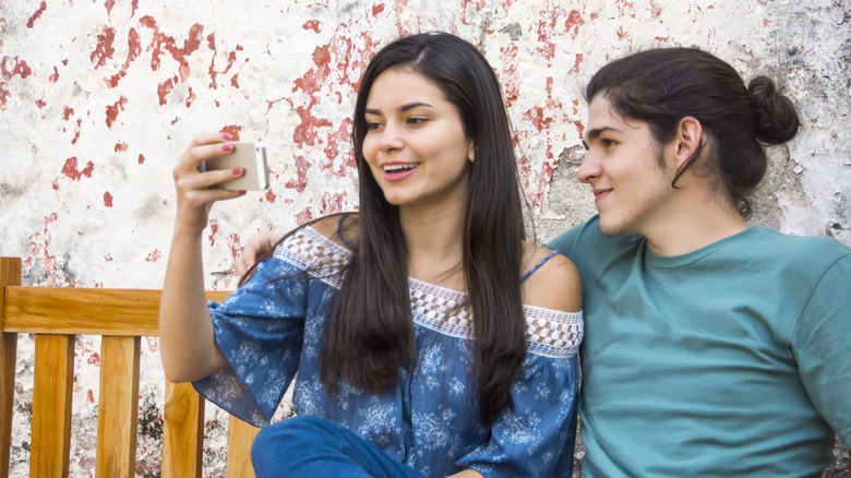 woman taking selfie