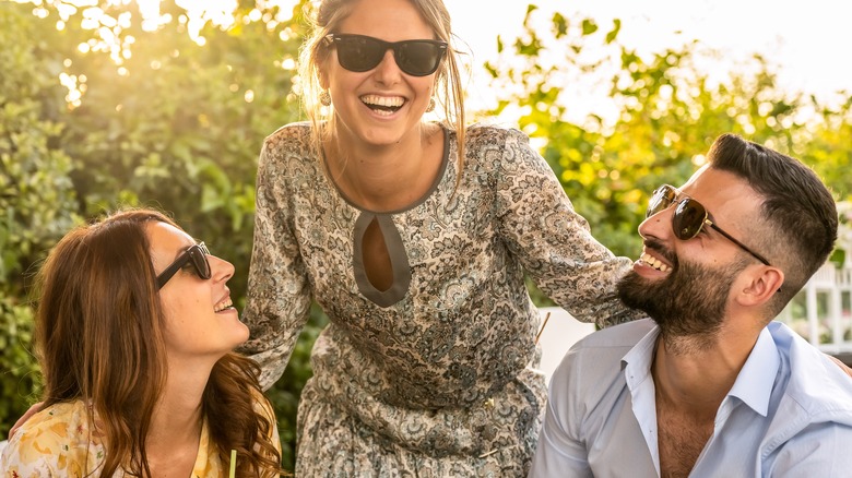 Friend group smiling and laughing