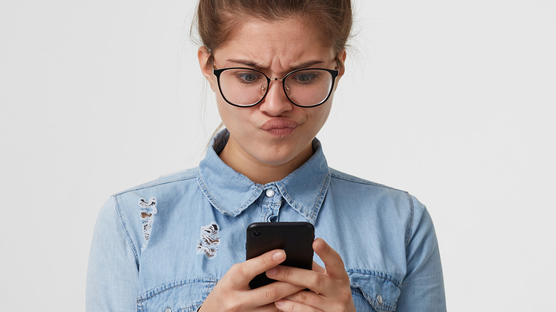 Woman looking at her phone